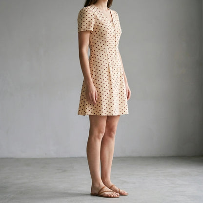 Chic Polka Dot Mini Dress for Women, V Neck, A-Line, Natural Waist, Short Sleeve, Casual Summer Party, Beige Polyester — lifestyle