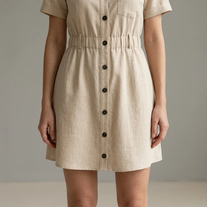 Model wearing Apricot Collared Button Mini Dress with close focus on the product
