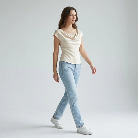 Second natural lifestyle image of a model wearing apricot-cowl-neck-lace-tee