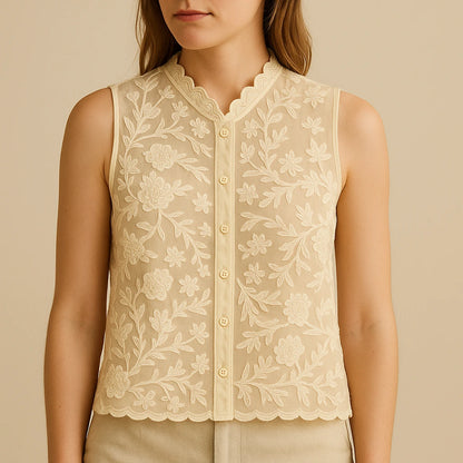 Model wearing Apricot Floral Embroidery Tank Top Sleeveless Stylish Summer with close focus on the product