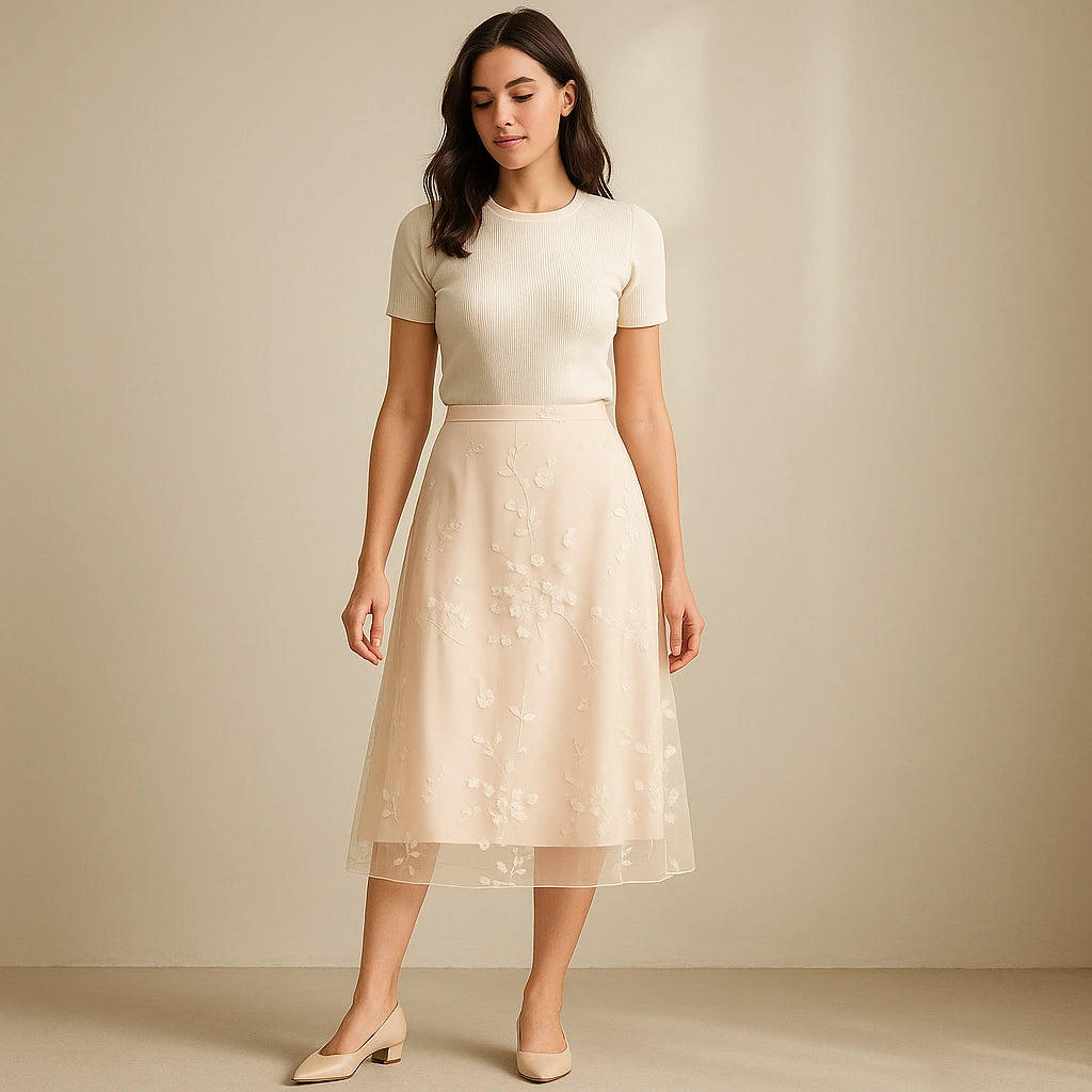 Natural lifestyle image of a model wearing Apricot Floral Embroidered Mesh Midi Skirt High Waist A-Line Elegant