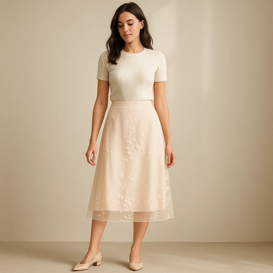 Natural lifestyle image of a model wearing Apricot Floral Embroidered Mesh Midi Skirt High Waist A-Line Elegant