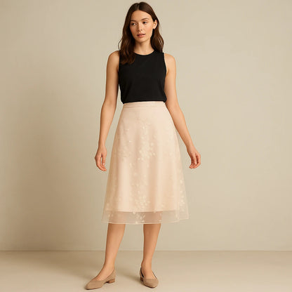 Second natural lifestyle image of a model wearing Apricot Floral Embroidered Mesh Midi Skirt High Waist A-Line Elegant