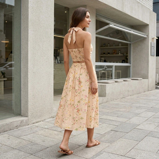 Third natural lifestyle image of a model wearing Apricot Floral Halter Two-Piece Skirt Set
