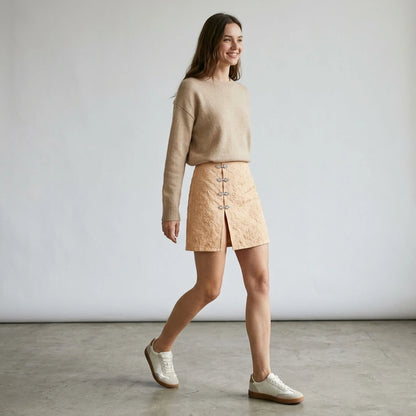 Third natural lifestyle image of a model wearing apricot-jacquard-slit-mini-skirt