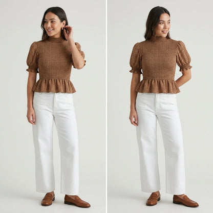 Third natural lifestyle image of a model wearing apricot-lantern-sleeve-shirred-plaid-tee