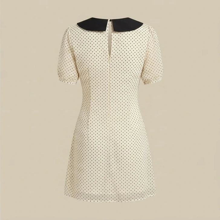 Back product-only image of apricot-polka-dot-contrasting-mini-dress