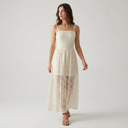 Third natural lifestyle image of a model wearing Apricot Sheer Lace Slip Maxi Dress