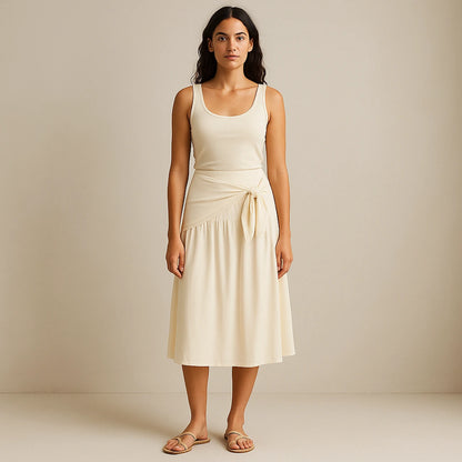 Third natural lifestyle image of a model wearing Apricot Spliced Tie Midi Skirt High Waist A-Line Casual