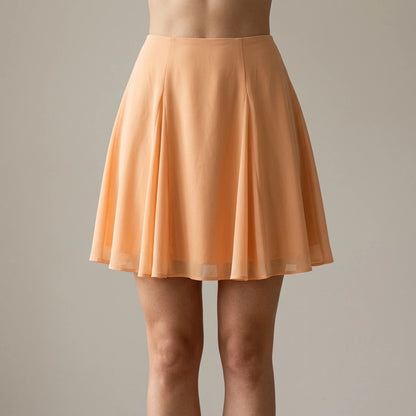 Model wearing Apricot Sweetheart Neck Chiffon Tank Top with close focus on the product