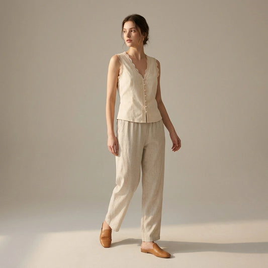 Natural lifestyle image of a model wearing apricot-v-neck-lace-vest