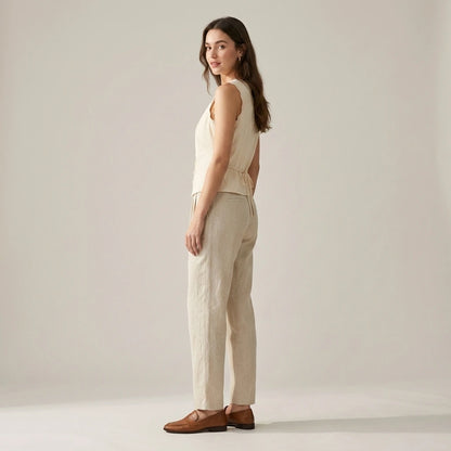 Second natural lifestyle image of a model wearing apricot-v-neck-lace-vest