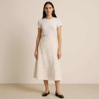 Third natural lifestyle image of a model wearing Beige Floral Slit Midi Skirt High Waist A-Line Elegant