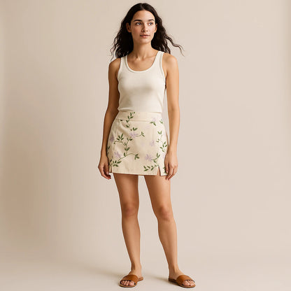 Second natural lifestyle image of a model wearing Beige Floral Embroidery Skirt Slit Vacation Summer Modern