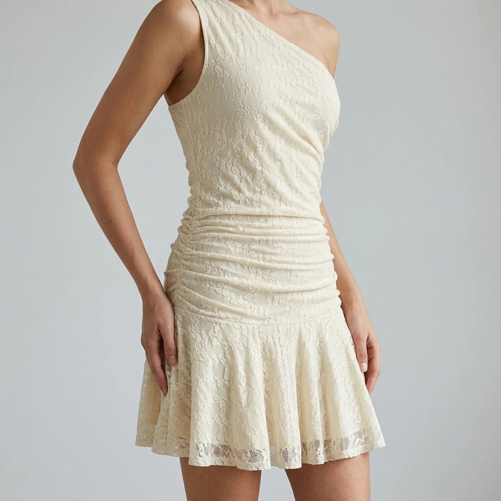 Model wearing beige-lace-one-shoulder-mini-dress with close focus on the product