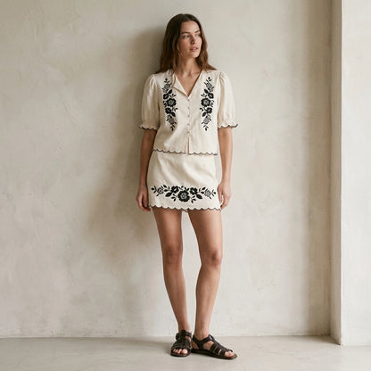 Third natural lifestyle image of a model wearing Beige Puffed Sleeve Embroidery Contrasting Blouse