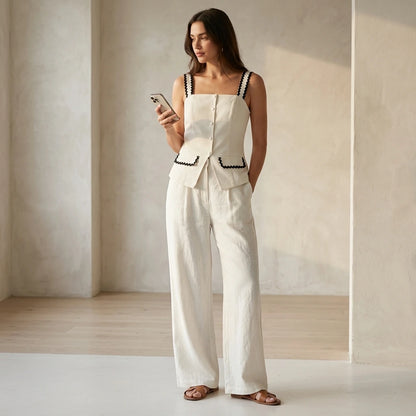 Natural lifestyle image of a model wearing beige-square-neck-contrasting-cami-top