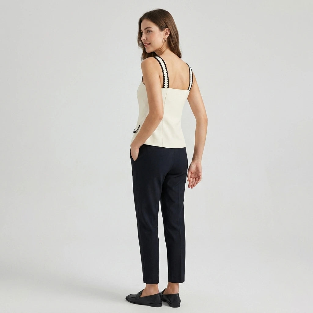 Second natural lifestyle image of a model wearing beige-square-neck-contrasting-cami-top