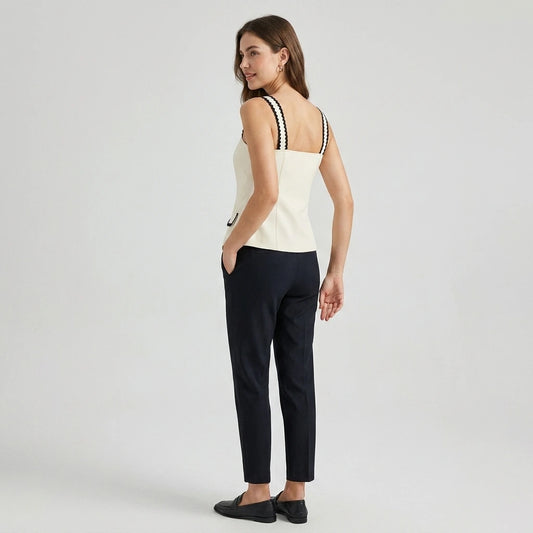 Second natural lifestyle image of a model wearing beige-square-neck-contrasting-cami-top
