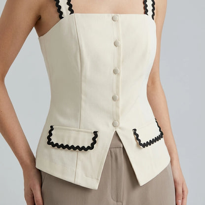Model wearing beige-square-neck-contrasting-cami-top with close focus on the product
