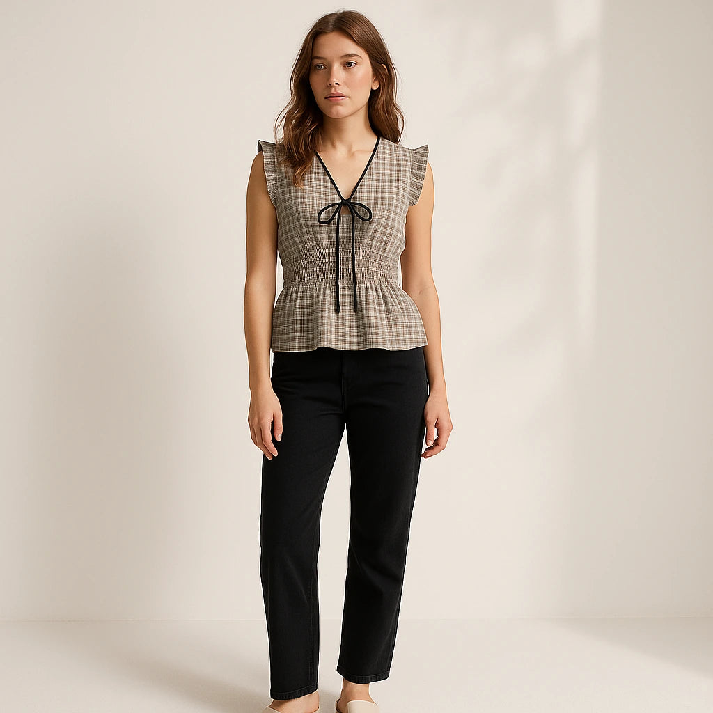 Natural lifestyle image of a model wearing Black Pleated Ruched Tank Top Shirred Ruffle Plaid V Neck Sleeveless Textured Workwear Summer