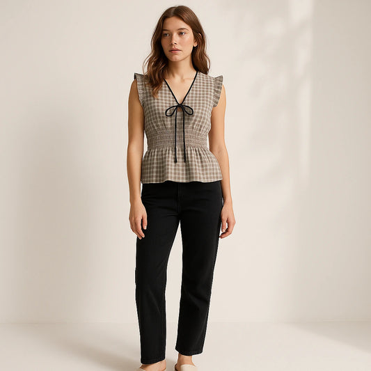 Natural lifestyle image of a model wearing Black Pleated Ruched Tank Top Shirred Ruffle Plaid V Neck Sleeveless Textured Workwear Summer