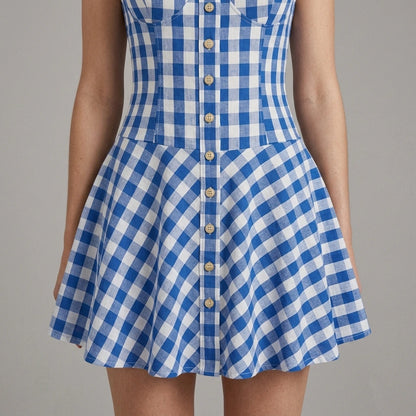 Model wearing Blue Plaid Slip Mini Dress with close focus on the product