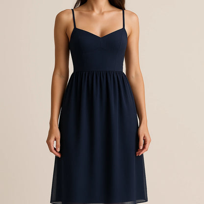 Model wearing Blue Shirred Slip Maxi Dress Flowy High Waist Sleeveless Mesh Occasion Summer with close focus on the product