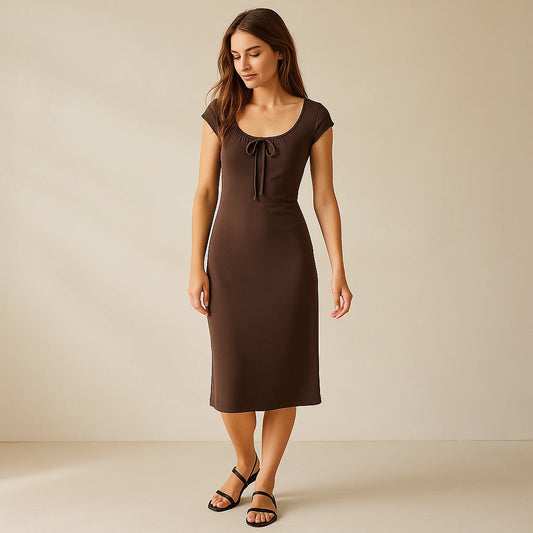 Natural lifestyle image of a model wearing Brown Boat Neck Cap Sleeve Midi Dress Ruched Sheath Knit