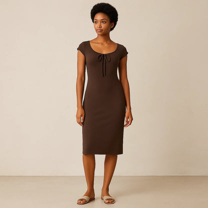 Third natural lifestyle image of a model wearing Brown Boat Neck Cap Sleeve Midi Dress Ruched Sheath Knit