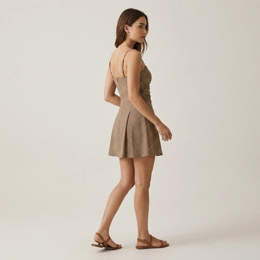 Second natural lifestyle image of a model wearing Brown Plaid Ruched Slip Mini Dress