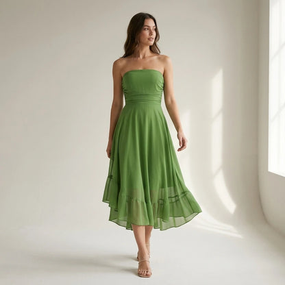 Third natural lifestyle image of a model wearing Green Flowy Strapless Midi Dress