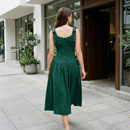 Third natural lifestyle image of a model wearing Green Ruched A-Line Sleeveless Maxi Dress