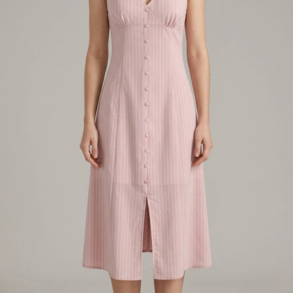 Model wearing pink-striped-v-neck-sleeveless-midi-dress with close focus on the product