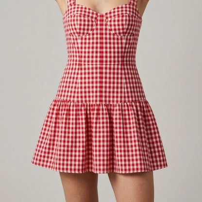 Model wearing Red Plaid Sweetheart Neck Slip Mini Dress with close focus on the product