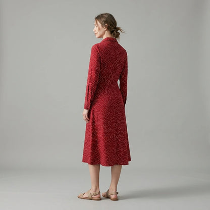 Second natural lifestyle image of a model wearing Red Polka Dot A-Line Midi Dress