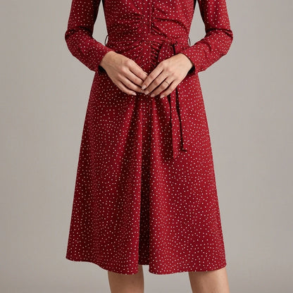 Model wearing Red Polka Dot A-Line Midi Dress with close focus on the product