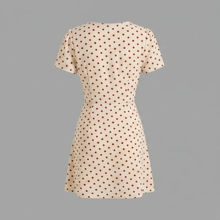 Back product-only image of the-beige-polka-dot-button-mini-dress