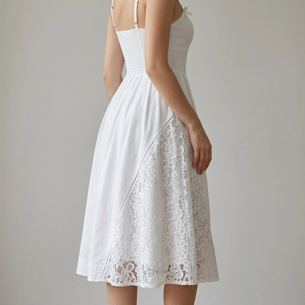 Model wearing White Lace Splicing Shirred Midi Dress with close focus on the product