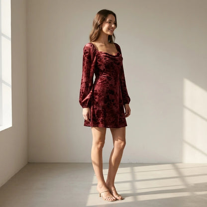 Natural lifestyle image of a model wearing wine-red-cowl-neck-floral-mini-dress