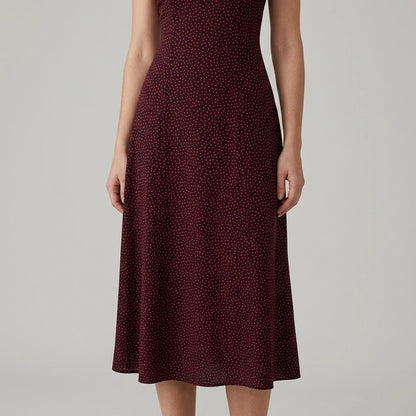Model wearing wine-red-slip-midi-dress with close focus on the product